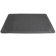 The Petmate Extra Large Litter Catcher Mat is a gray, rectangular doormat with a textured surface and small paw prints at each corner. Its perfect for your cats litter box area, effectively catching litter while lying soft and flat on the floor.