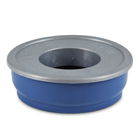 The Petmate No Spill Pet Bowl by Petmate is a blue, heavy-duty plastic water bowl with a gray rim, featuring NO SPILL BOWL embossed on the rim and a center hole, designed to prevent spills with its splash-proof design.