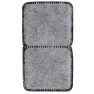 The Petmate Fresh Flow Replacement Charcoal Filter by Petmate is a rectangular, gray, felt-like filter with two sections and black, stitched edges featuring a grid pattern. Its soft, fibrous texture resembles charcoal filters and is ideal as replacement filters for pet water fountains.