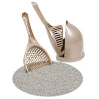The Petmate Scoop N Hide Cat Litter Scoop, by Petmate, is a beige scoop and holder set on a circular textured mat. The deep bucket scoop with sifting slots fits into a curved-back holder, offering easy cleaning and organization.