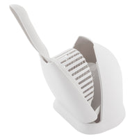 The Petmate Scoop N Hide Cat Litter Scoop is a white tool featuring a slotted surface with an attached handle, specifically designed for easy gripping. Its innovative structure makes scooping and handling cat litter effortless while allowing the handle to extend upright comfortably.