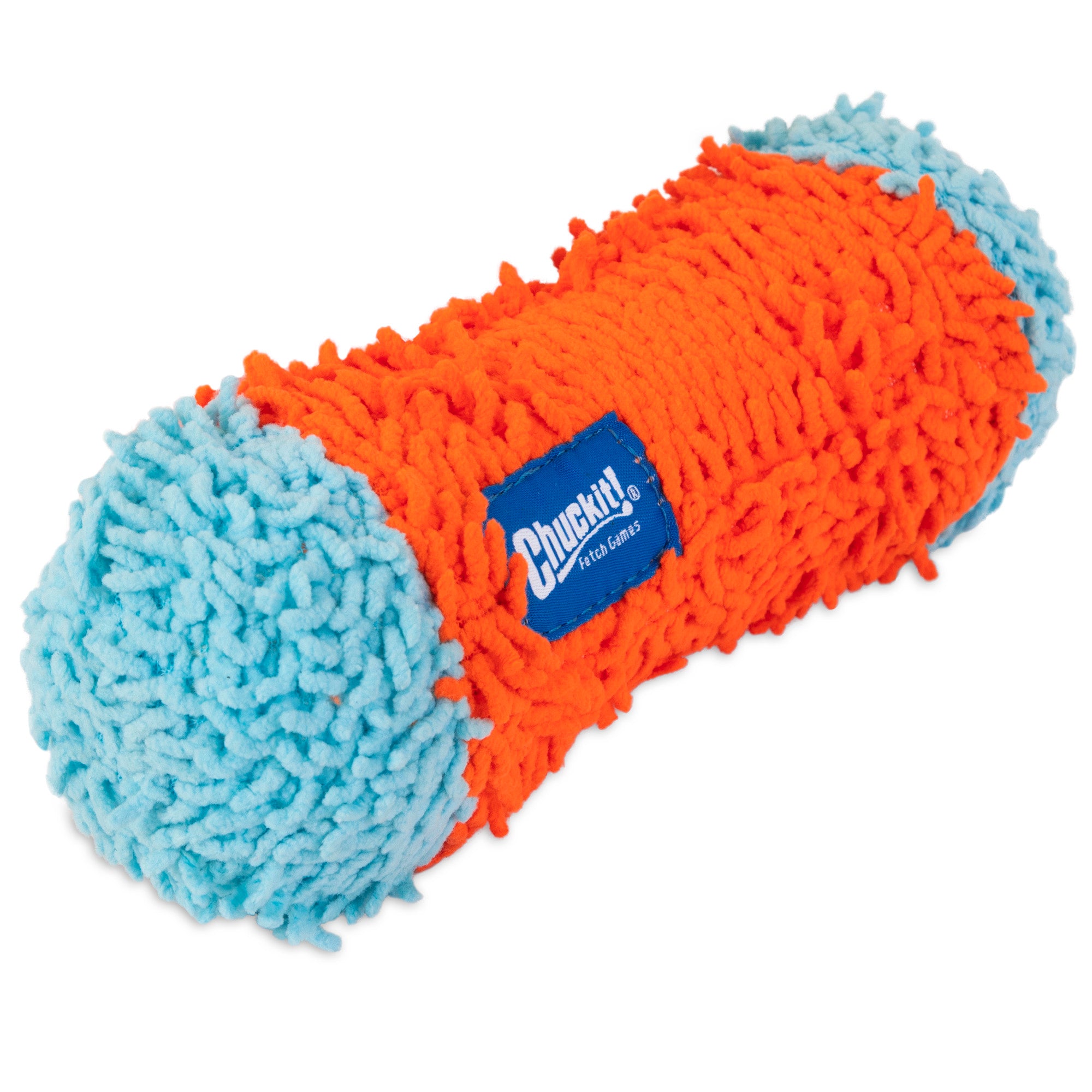 The Chuckit! Indoor Tumble Bumper by Chuckit is a cylindrical dog toy with an orange body and light blue ends, made from fuzzy, textured fabric. It features Bounceflex Core Technology and a blue label with white text on the orange section.