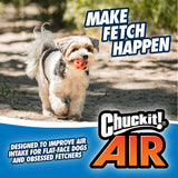 A fluffy small dog carries a Chuckit Air Fetch Ball, highlighting its durable design for improved air intake. The image features the text Make Fetch Happen for fetch enthusiasts and flat-face dogs.