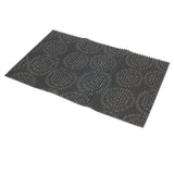 The Petmate Ribbed Foam Feeding & Watering Mat blends style and function with its rectangular dark gray felt and circular ribbed design. Its non-skid backing provides stability, making it a stylish and practical addition to any dining area.