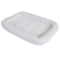 The SnooZZy Faux Sheepskin Bolster Kennel Mat by Snoozzy is a rectangular, fluffy white pet bed with raised edges and a soft surface, ideal for crate training. This cozy haven resembles sheepskin and is machine washable for easy maintenance.