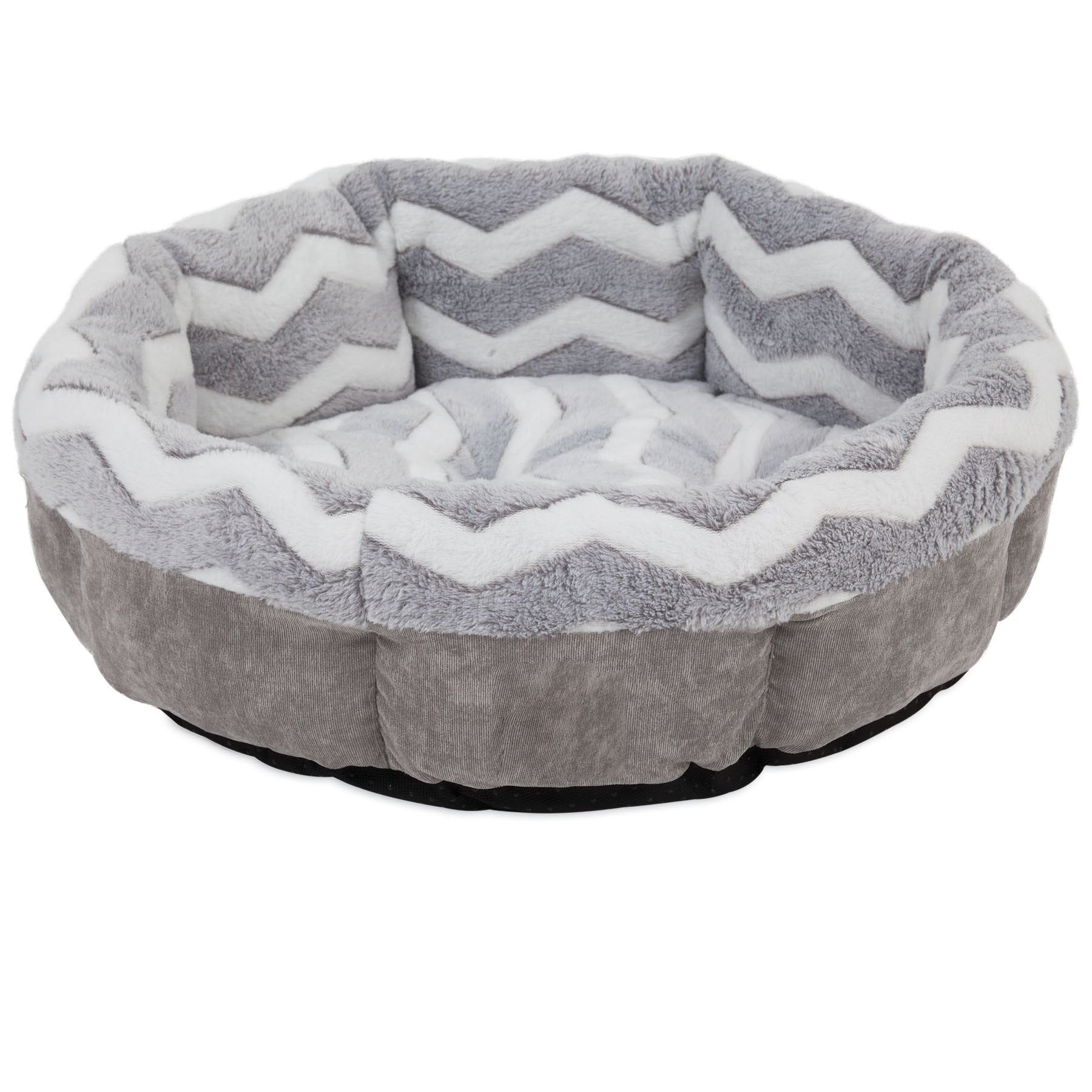 The SnooZZy Round Shearling Bolster Dog Bed by Snoozzy, in gray and white, features a zigzag pattern, plush fabric, and raised sides for comfort. Designed for aging pets, it has a non-skid bottom to ensure stability and safety.