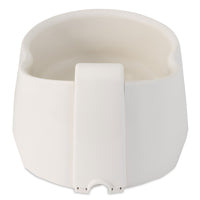 Enjoy your morning coffee from a white ceramic mug with a wide handle while ensuring your cats well-being with the Petmate Deluxe Fresh Flow Fountain. Its smooth, rounded shape complements the minimalist design found in pet water fountains.