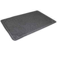 The Petmate Extra Large Litter Catcher Mat, by Petmate, is a rectangular gray mat with a textured surface and small paw print patterns in each corner. Designed for catching litter box excess, its slightly raised edge effectively contains spills.