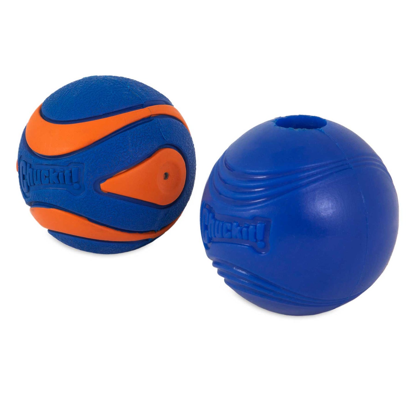 Two blue and orange rubber dog balls from the Chuckit Sonic Fetch Pack feature brand logos. The left ball has an orange curved pattern, while the right one is solid blue with grooves and an emblem.