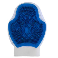 The JW 3-In-1 Dog Grooming Glove by Jw is blue, has a textured paw print design, a white fabric back, and an adjustable wrist strap for a snug fit. This glove is machine washable, combining convenience with effective pet grooming.