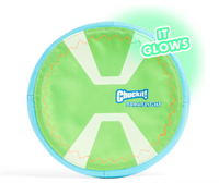The Chuckit! Paraflight Max Glow Flyer Dog Toy, a circular green and blue disc with Chuckit! Paraflight text and IT GLOWS in vibrant green, is perfect for fetch lovers wanting to play day or night.